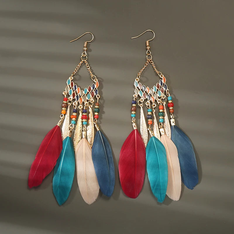 Aros Largos Boho con Pluma y Borlas