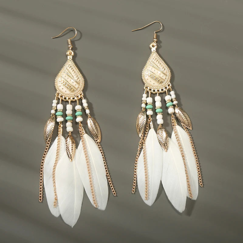 Aros Largos Boho con Pluma y Borlas