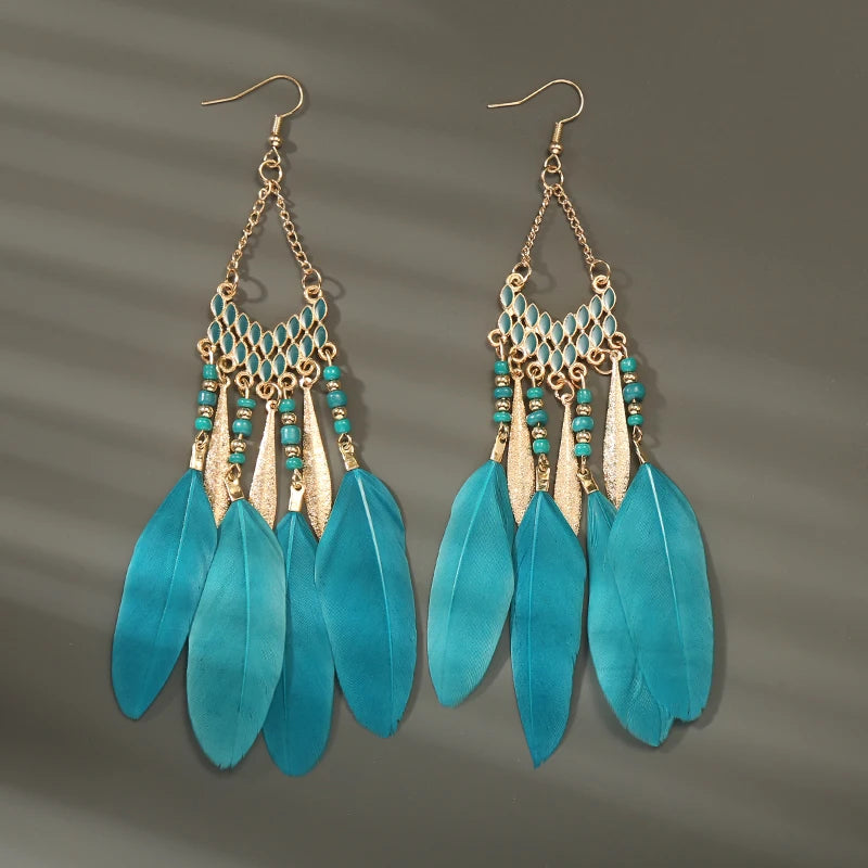 Aros Largos Boho con Pluma y Borlas